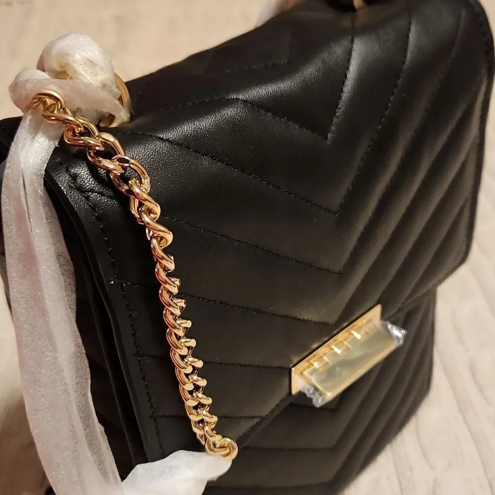 I Zac Zac Posen soft Earthette Convertible black quilted  Leather backpack